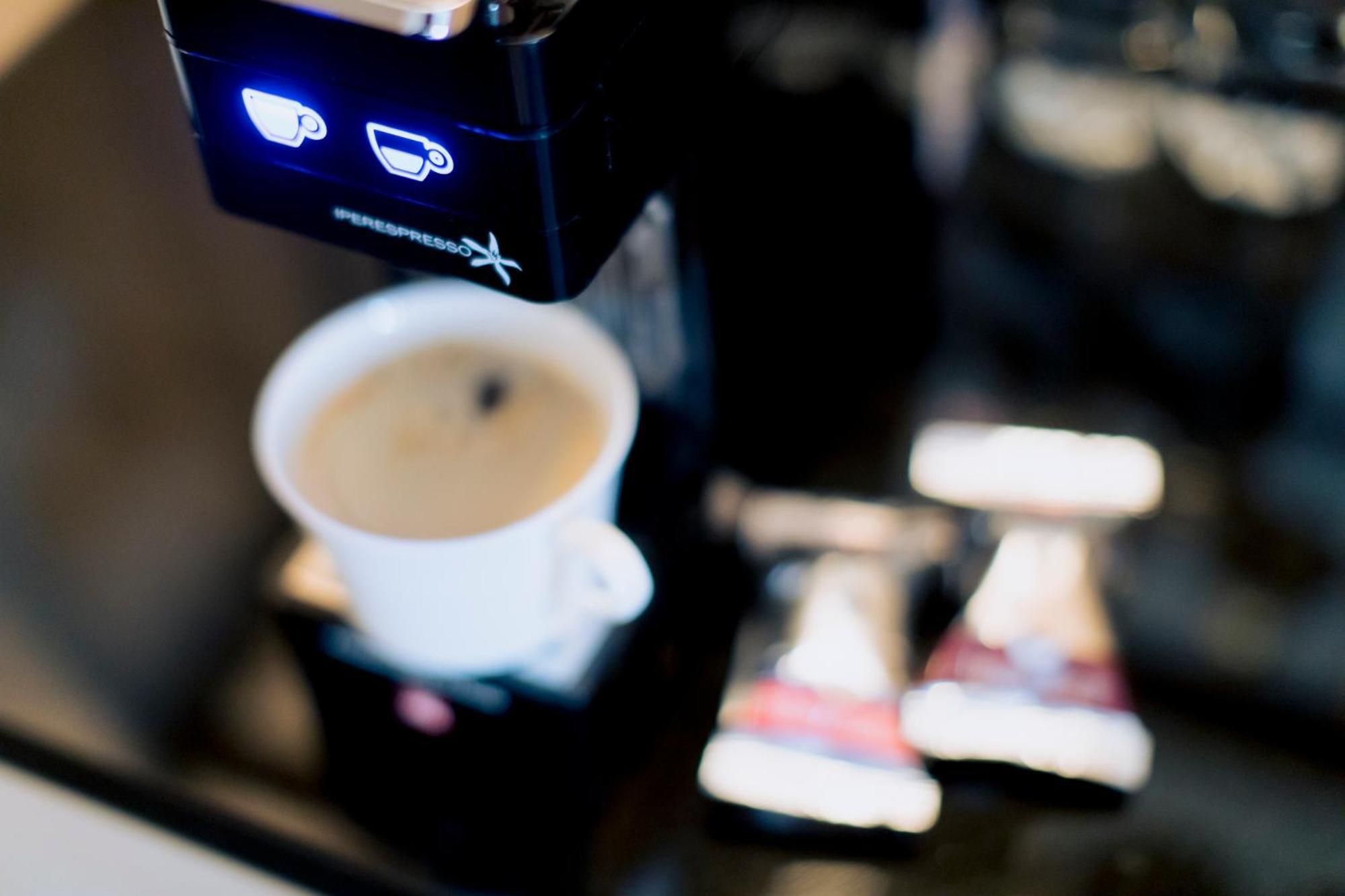 The Thousand Kyoto Dış mekan fotoğraf A Nespresso machine